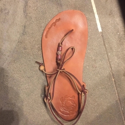 Good Earth Sandals-photo of sandal with stamped logo and handwriting